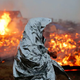 Campers set structures on fire in preparation for the Army Corps’ 2 p.m. CT deadline Feb. 22, 2017. (Stephen Yang/Getty Images)